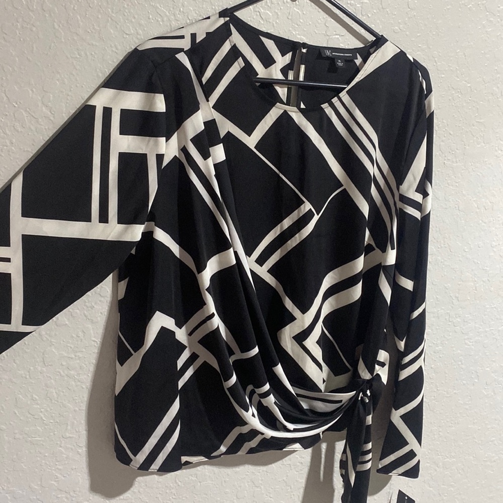 NWT INC Varsity top